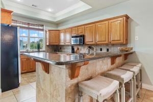 Køkken eller tekøkken på Periwinkle Paradise