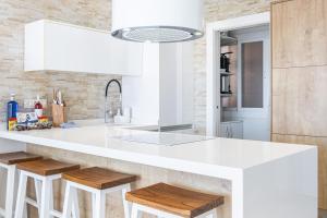 Kuchyň nebo kuchyňský kout v ubytování Veracruz 5-C Deluxe Apartment Levante Beach