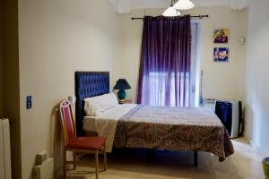 Łóżko lub łóżka w pokoju w obiekcie BOOKINGHAM ★Apartaments & Suites
