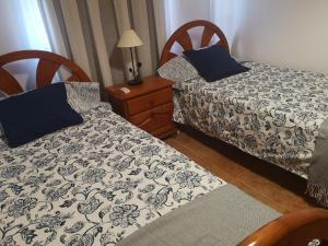 Postel nebo postele na pokoji v ubytování Casa Dolors + 22 fotografií