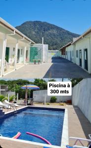een villa met een zwembad en een bord waarop staat pizza mijlenver bij Porto Suítes Peruíbe in Peruíbe