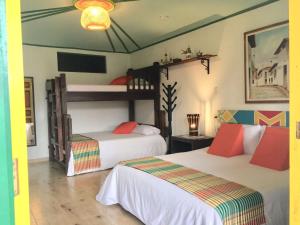 Postel nebo postele na pokoji v ubytování Mamatina Hotel