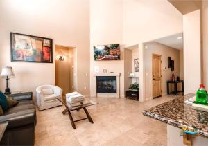 a living room with a couch and a table at Come, Experience, Collect memories 24-1 in San Felipe