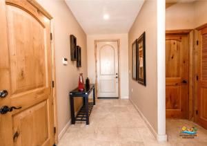 a hallway with a door and a stairway with a stair case at Come, Experience, Collect memories 24-1 in San Felipe