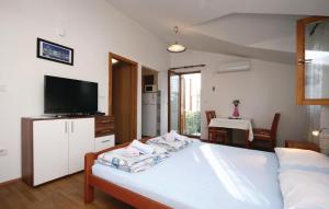 Posteľ alebo postele v izbe v ubytovaní Studio Apartments Izabela