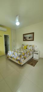Katil atau katil-katil dalam bilik di Pousada da Drica