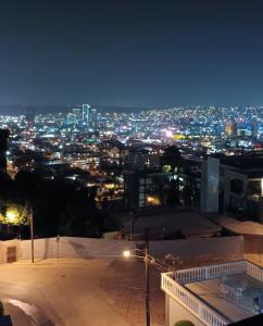 a view of a city at night with lights at Trendy green Cabin in Tijuana