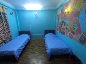 Un ou plusieurs lits dans un hébergement de l'établissement Hello KTM Hostel