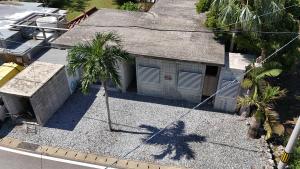 an overhead view of a house with a shadow at ユナパ in Yonaha