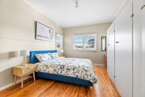 Ένα ή περισσότερα κρεβάτια σε δωμάτιο στο 9 Bay Street, Narooma