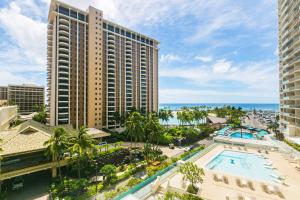 an aerial view of a resort with a pool and the ocean at Ilikai Tower 618 Lagoon View 1BR in Honolulu