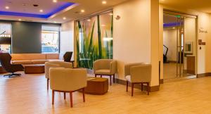 The lobby or reception area at EVEN Hotel Manchester Airport, an IHG Hotel