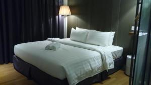 Voodi või voodid majutusasutuse T+ Hotel Butterworth toas