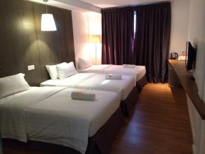 Voodi või voodid majutusasutuse T+ Hotel Butterworth toas