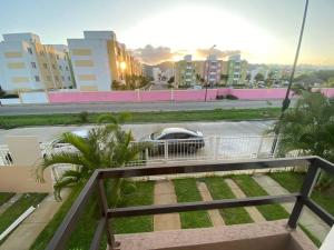a view of a street with a car in a parking lot at ¡Descubre tu oasis en Acapulco! Casa vacacional. in Acapulco
