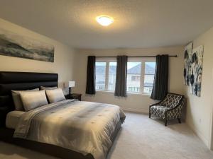 Voodi või voodid majutusasutuse Spacious,comfy house,less than 15 mins to Niagara Falls toas