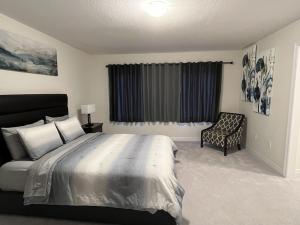 Voodi või voodid majutusasutuse Spacious,comfy house,less than 15 mins to Niagara Falls toas