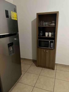 Kuchyň nebo kuchyňský kout v ubytování Apartamentos Trebol + 1 fotografie