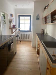 a kitchen with a sink and a counter top at hello. DIE FERIENWOHNUNG in Arbesbach