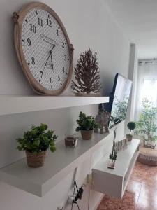 TV a/nebo společenská místnost v ubytování Apartamentos custodio