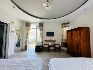 HOTEL 86 PHAN THIẾT tesisinde bir televizyon ve/veya eğlence merkezi