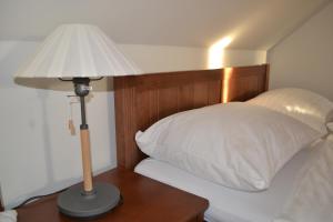 Letto o letti in una camera di Apartmány Chajdovka