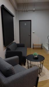 Area soggiorno di A lazy person hostel