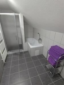 a small bathroom with a shower and a sink at Ubytovanie v súkromí Horec in Liptovský Mikuláš +100 photos