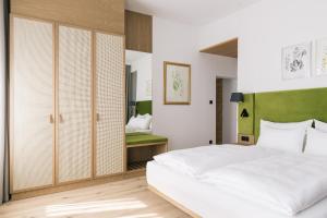 Voodi või voodid majutusasutuse Bio-Hotel Schani Wienblick toas