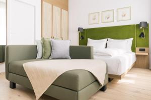 Voodi või voodid majutusasutuse Bio-Hotel Schani Wienblick toas