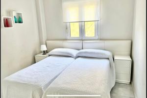 Posteľ alebo postele v izbe v ubytovaní MARBELLA - ALICATE BEACHFRONT Apartment-9 + 37 fotografií
