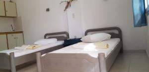 Postel nebo postele na pokoji v ubytování 11 Perasma Kypri Beach