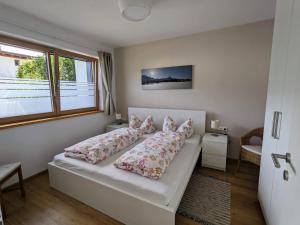 Postel nebo postele na pokoji v ubytování Ferienwohnung Bergzauber
