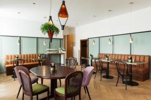 Restoran või mõni muu söögikoht majutusasutuses Bio-Hotel Schani Wienblick