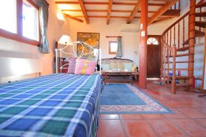 Postel nebo postele na pokoji v ubytování Auberge Koyama