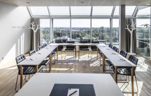 Um restaurante ou outro lugar para comer em First Hotel Planetstaden