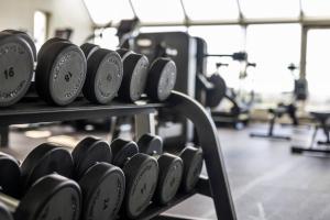 O centro de fitness e/ou as comodidades de fitness de First Hotel Planetstaden
