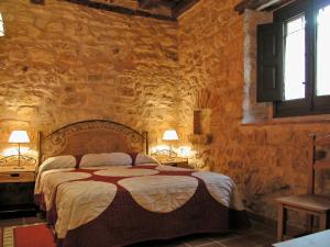 Posteľ alebo postele v izbe v ubytovaní Las Casas del Duraton