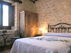 Posteľ alebo postele v izbe v ubytovaní Las Casas del Duraton