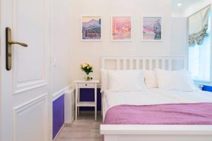 Postel nebo postele na pokoji v ubytování Revelton Suites Tallinn