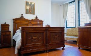 Postel nebo postele na pokoji v ubytování ABBAZIA SS. QUIRICO E GIULITTA