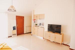 a large living room with a flat screen tv at 44 Forty Four Coast - Espinho in Espinho