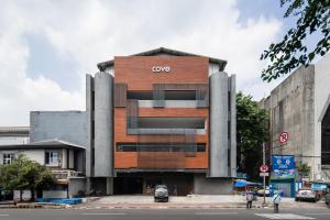 a building with the word love written on it at Cove Bona Sort Pasar Baru in Jakarta