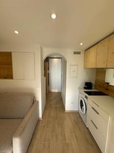 Kuchyň nebo kuchyňský kout v ubytování Appartement moderne Santa Giulia