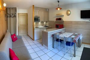 Kuchyň nebo kuchyňský kout v ubytování Résidence Atrey 103 Clés Blanches Courchevel