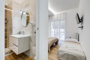 Koupelna v ubytování VATICANDREAM GUEST HOUSE + 113 fotografií