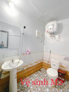 Ett badrum på Táo Homestay Venuestay