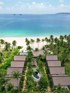 an aerial view of the beach and resort at ANGKLA Beach Club & Boutique Resort in El Nido