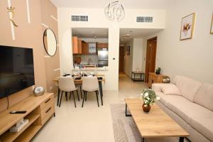 Η κουζίνα ή μικρή κουζίνα στο Elite 1BR Apartment - Modern Stay in Al Reem, Near Reem Mall