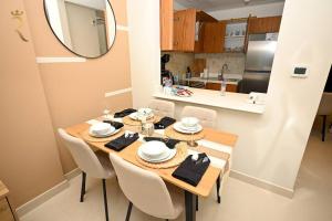 Kuchyň nebo kuchyňský kout v ubytování Elite 1BR Apartment - Modern Stay in Al Reem, Near Reem Mall